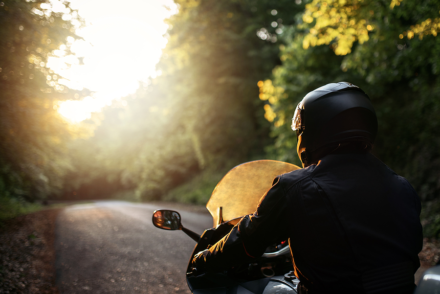 Biker With His Motorcycle On Street, Preparing For The Ride. Mot